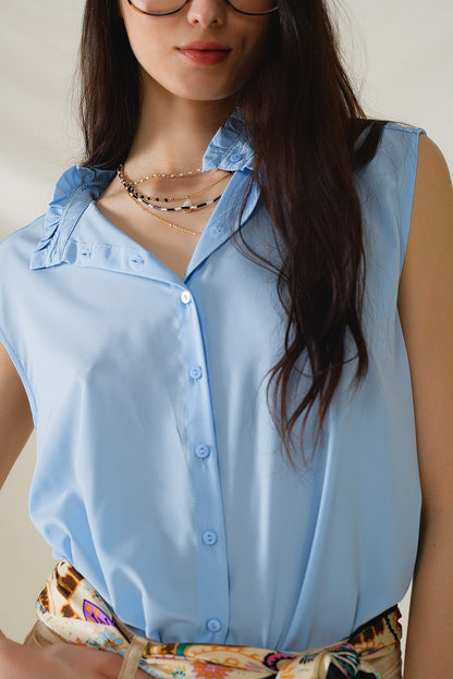 Blusa abotonada azul sin mangas con cuello mao