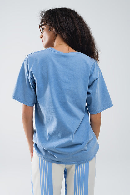 Camiseta azul con texto manhattan