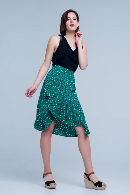 Falda midi verde con estampado floral de lunares y detalle de volante