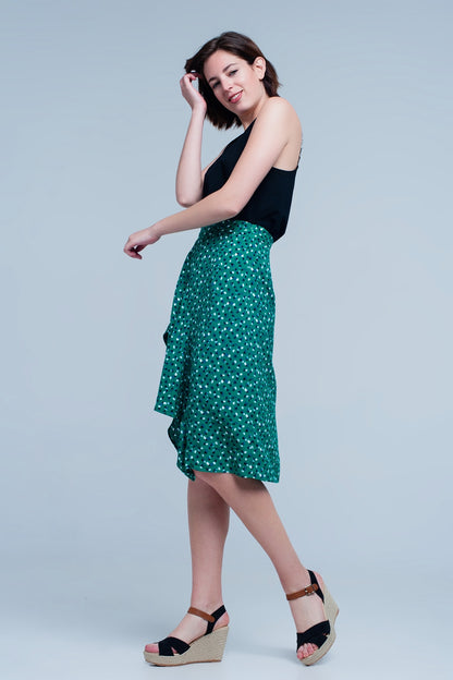 Falda midi verde con estampado floral de lunares y detalle de volante