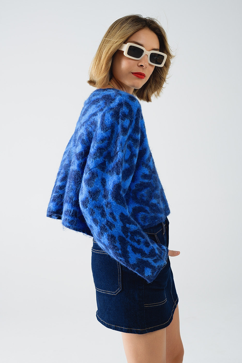 Jersey azul con estampado de leopardo de punto con lana