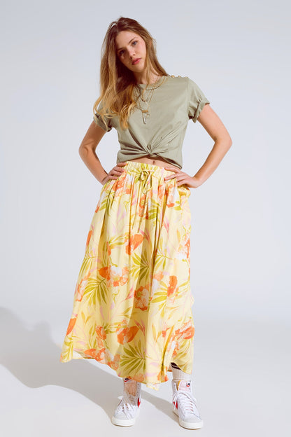 maxi falda amarilla con estampado tropical