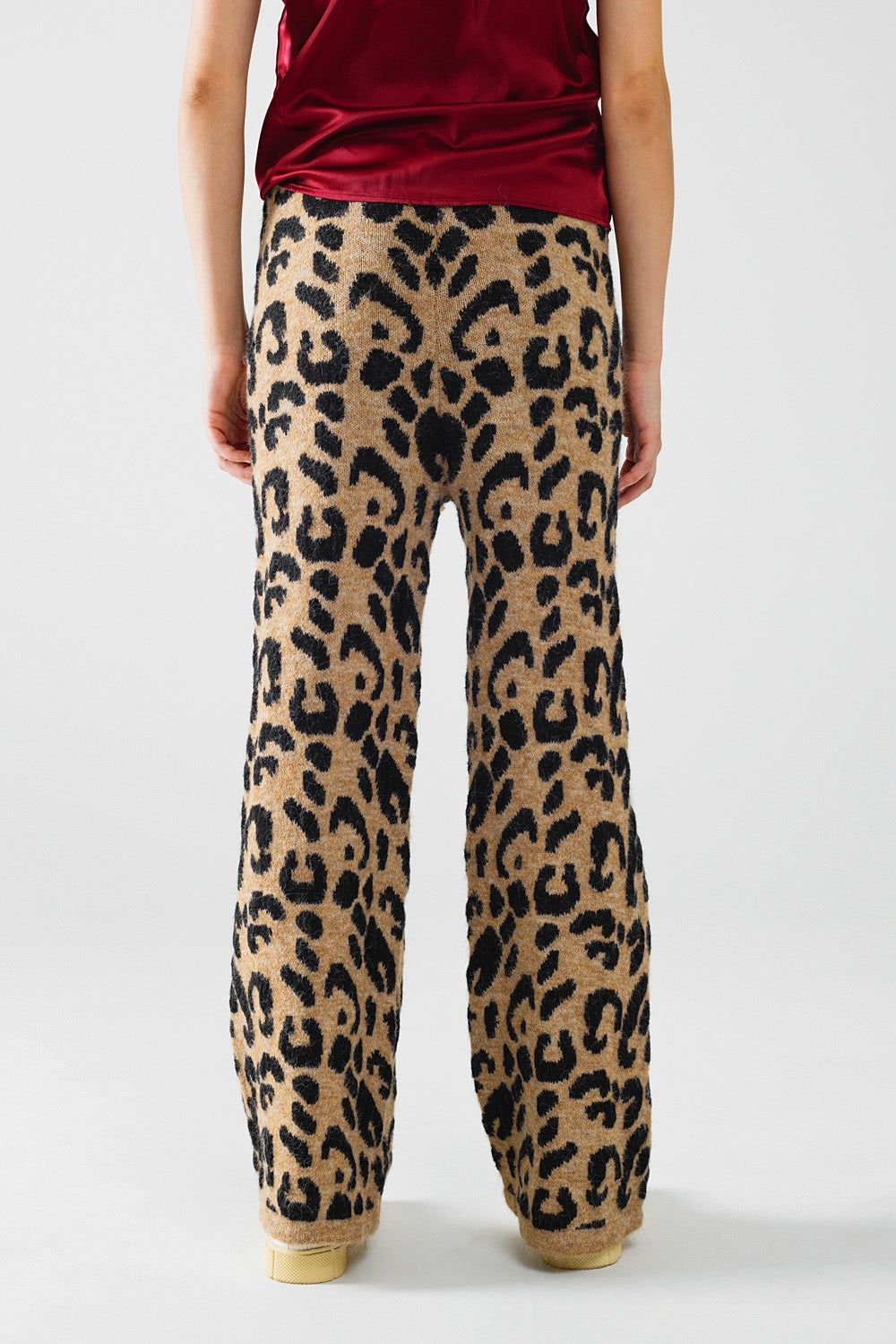 Pantalón con estampado de leopardo punto elástico y detalle de cordón