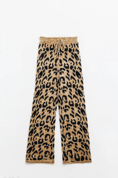 Pantalón con estampado de leopardo punto elástico y detalle de cordón