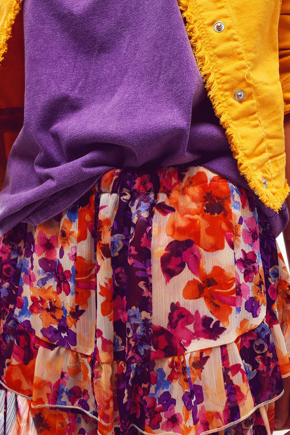 Shorts con volantes en estampado floral