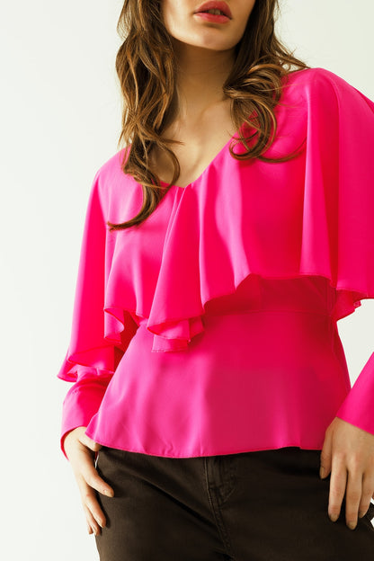 Top con cuello en V puños abotonados y lazo en la espalda en color fucsia