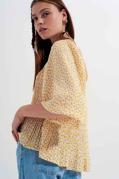 Top con escote cuadrado manga abullonada y estampado floral en amarillo