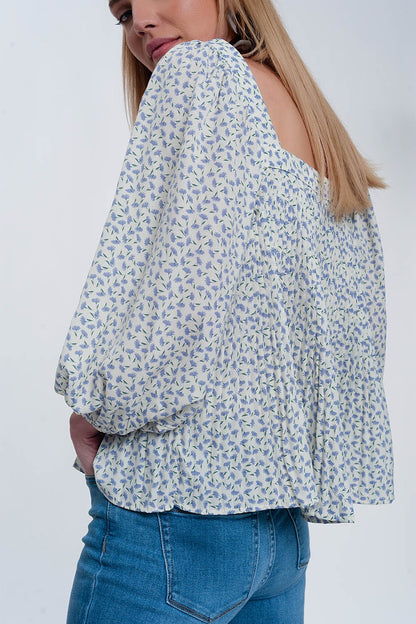 Top con escote cuadrado manga abullonada y estampado floral en azul