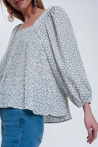 Top con escote cuadrado manga abullonada y estampado floral en azul