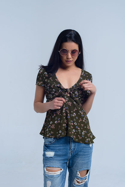 Q2 Top verde con estampado floral